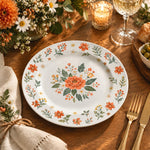 Daily Decorative Charger Plate – Rose Border Orange decorative charger plate on a styled table.