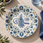 Ramadan Decorative Charger Plate – Blue Gold Script Bloom decorative charger plate on a styled table.