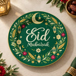 Green charger plate with gold trim featuring Eid script, crescent and lanterns among olive leaves