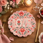 Pink scalloped plate with cream LOVE letters between coral tulips