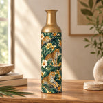 Jungle Leopard Metal Flower Vase – Bird of Paradise Foliage decorative metal vase shown in a styled room scene.