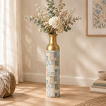 Indigo Weave Metal Flower Vase – Faded Blossom Patchwork decorative metal vase shown in a styled room scene.