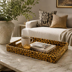 Orange Leopard Print Plastic Serving Tray – Full Print Border full-print plastic serving tray shown in a styled room scene.