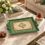 Sage green tray with gold trim featuring calligraphy framed by sage green florals and slim vines