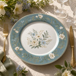Powder-blue rim decorative charger plate with white peonies, forget-me-not florals, and a gold dotted border for French country tables.