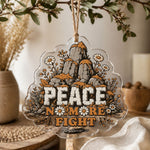 Clear acrylic wall decor showing a stone cairn wrapped in daisies with Peace and No More Fight lettering.