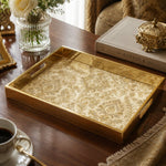 Vintage Gold Damask Arabesque Glass Serving Tray, 40x30cm on a coffee table, featuring UV-printed artwork on tempered glass with an electroplated frame and matching handles.