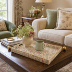 William Morris Sage Pink Floral Rectangular Tray | Mother's Day styled on a coffee table with books, a candle, and decorative accessories.