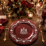 Decorative charger plate on a linen table.