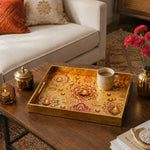 Diwali Lotus Mandala Decorative Tray with Diyas - Minti Home styled on a console table with a ceramic mug and books beside a brass lamp.