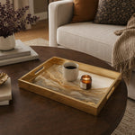 Deep Green Marble Gold Veins Decorative Tray with Copper Flecks and Gold Frame | Minti Home displayed on a dining table with a porcelain teapot and fresh flowers, vintage cabinet in background.