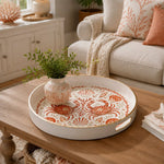 White tray with gold trim featuring decorative crab seashell and coral coastal pattern on warm ivory ground