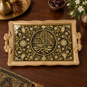 Black tray with gold trim featuring a gilded Arabic calligraphy medallion and floral vine border