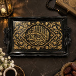 Black tray with gold trim featuring an arabesque calligraphy medallion and slim floral vines