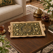 Black tray with gold trim featuring a gilded Arabic calligraphy medallion and floral vine border