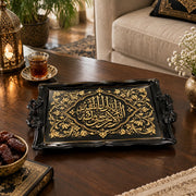 Black tray with gold trim featuring an arabesque calligraphy medallion and slim floral vines