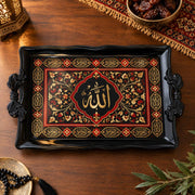Black tray with gold trim featuring a calligraphy medallion in crimson floral scrollwork