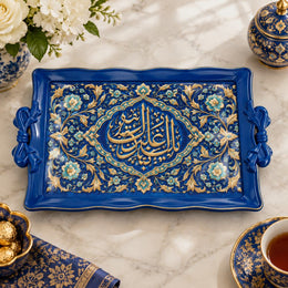 Royal blue tray with gold trim featuring a lobed Arabic calligraphy cartouche ringed by flowing floral vines