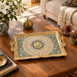 Gold and navy tray with gold trim featuring concentric Arabic calligraphy rings and a floral border