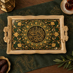 Black and beige tray with gold trim featuring an Arabic calligraphy medallion ringed by blooms and vines