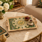 Emerald green tray with gold trim featuring concentric calligraphy bands and floral scrolls