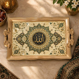Cream and forest green tray with gold trim featuring a sunburst calligraphy medallion and rosettes