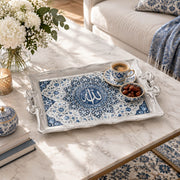Silver white tray with gold trim featuring a calligraphy medallion in layered cobalt lotus petals