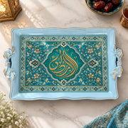 Turquoise tray with gold trim featuring a turquoise Arabic calligraphy medallion in a pointed arch with flowering vines