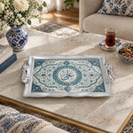 Slate and teal tray with gold trim featuring a calligraphy roundel in a lobed medallion frame