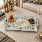 Ivory and navy tray with gold trim featuring a lobed calligraphy cartouche and floral scroll field