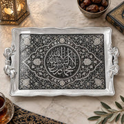 Silver and black tray with gold trim featuring a calligraphy medallion in a damask floral arch