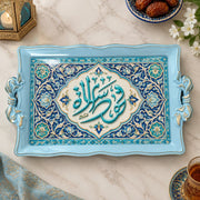 Light blue tray with gold trim featuring a central Arabic calligraphy cartouche amid floral scrollwork and beading