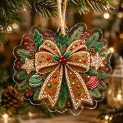 Gingerbread bow acrylic hanging wall decor with brown texture, white icing details, red and green ribbons, and jute twine.