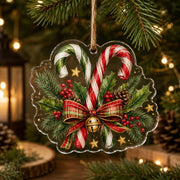 Clear acrylic hanging decor shaped like a watercolor red and white candy cane with holly leaves and a red bow.