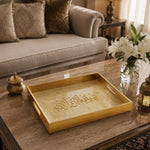 Bismillah Calligraphy Glass Serving Tray – Gold Islamic Border glass serving tray shown in a first styled room scene.