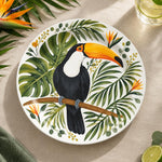 Daily Decorative Charger Plate – Toucan Palm Branch decorative charger plate on a styled table.