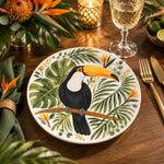 Daily Decorative Charger Plate – Toucan Palm Branch decorative charger plate on a styled table.
