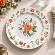 Daily Decorative Charger Plate – Rose Border Orange decorative charger plate on a styled table.