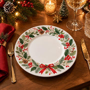 Christmas Decorative Charger Plate – Holly Bow Wreath decorative charger plate on a styled table.