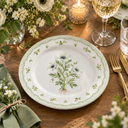 Daily Decorative Charger Plate – Herb Sprig Border decorative charger plate on a styled table.