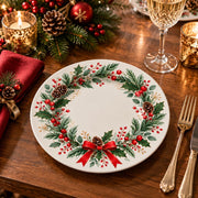 Christmas Decorative Charger Plate – Holly Ribbon Wreath decorative charger plate on a styled table.
