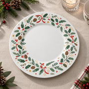 Christmas Decorative Charger Plate – Holly Bow Ring decorative charger plate on a styled table.