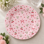 Valentine's Day Decorative Charger Plate – Cherry Blossom Bows decorative charger plate on a styled table.