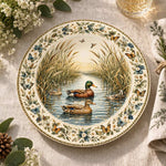 Daily Decorative Charger Plate – Ducks Reeds Cream decorative charger plate on a styled table.