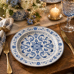 White charger plate featuring a cobalt blue damask medallion with dotted bands and acanthus border