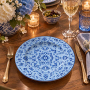 Pale blue charger plate featuring a tonal blue damask medallion and trailing floral sprigs