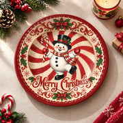 White charger plate with gold trim featuring a snowman on a peppermint swirl and holly border