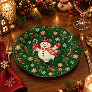 Green charger plate with gold trim featuring a snowman among candy canes and snowflakes