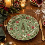Sage green charger plate with gold trim featuring a vintage tree among roses, tulips and leaves