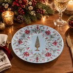 Powder blue charger plate with gold trim featuring a vintage tree in a ring of roses and scrolls